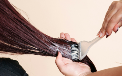 Hair colouring hairdresser colouring a clients hair